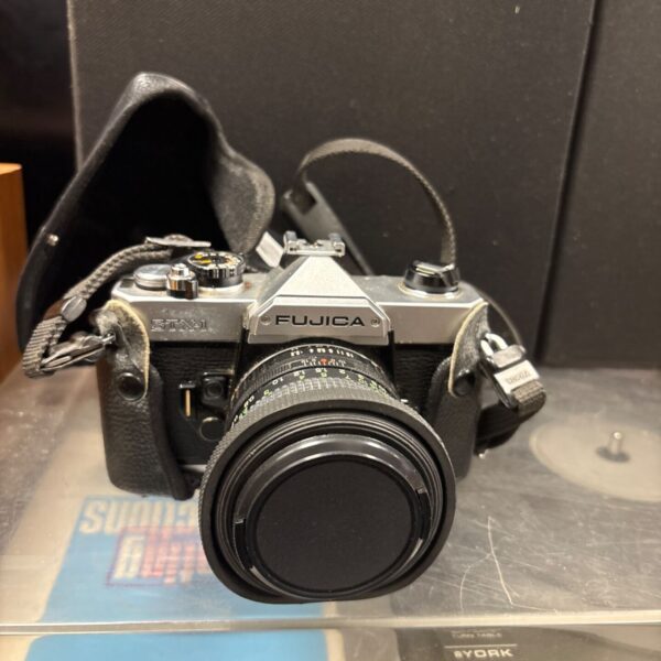Vintage Fujica STX-1 camera with fitted lens and black carrying case