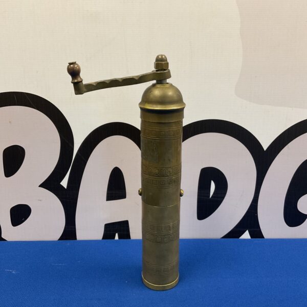 Vintage brass Greek coffee mill grinder with hand crank.
