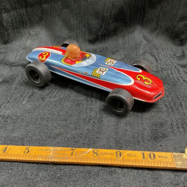 Vintage Hero tinplate race car with number 3.