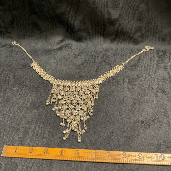 Vintage Indian silver tone bib necklace with cascading pendants.