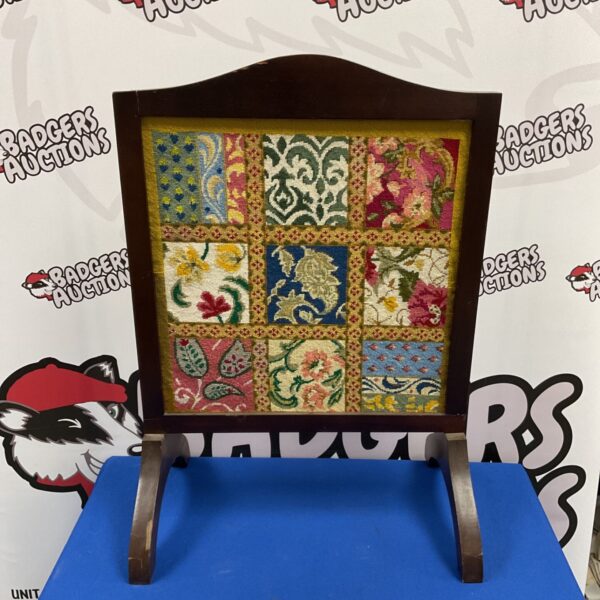 Vintage mahogany framed fire guard with panelled floral tapestry on curved stand
