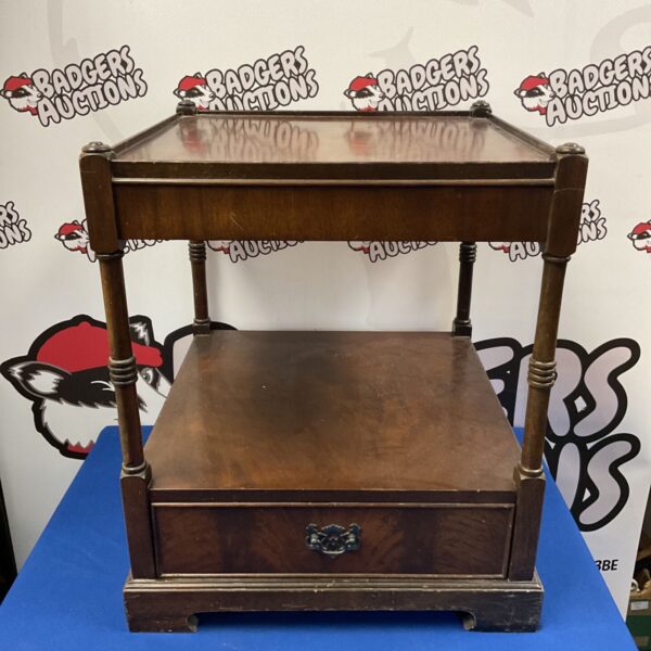 Vintage mahogany lamp table with two tiers and drawer.