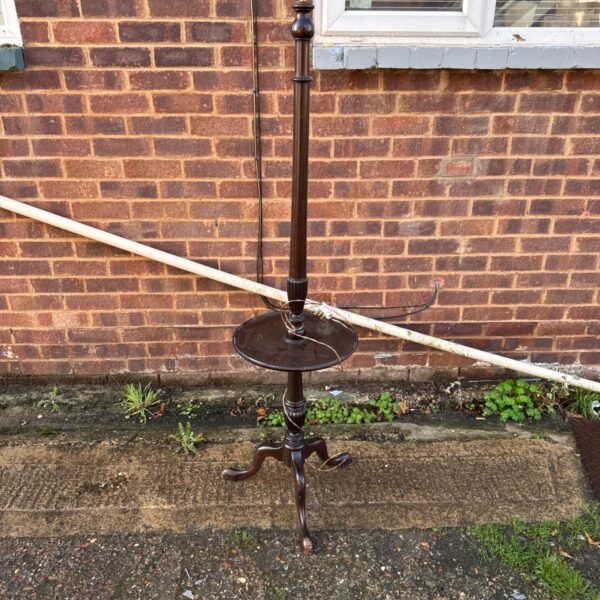 Vintage mahogany standard lamp with tripod base.