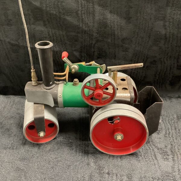 Vintage Mamod steam roller model with green boiler and red wheels