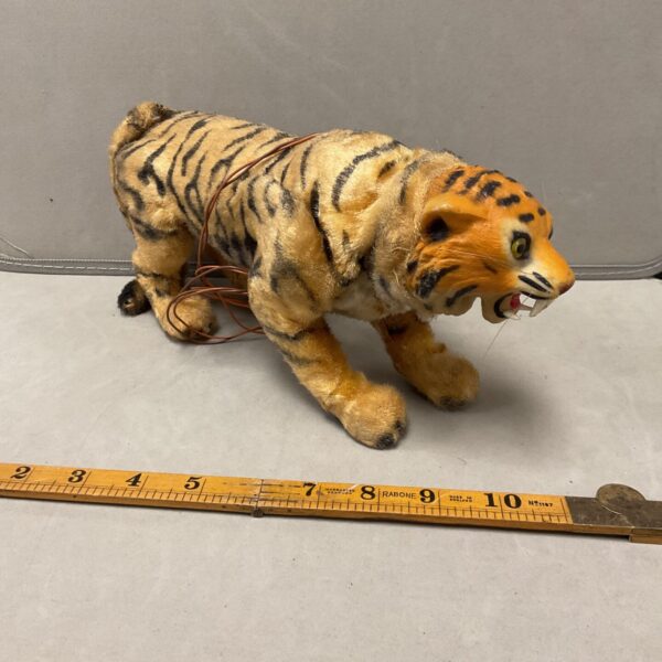 Vintage Marx battery-powered tiger toy, side view.