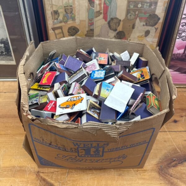 Large collection of vintage matchboxes and booklets for collectors.