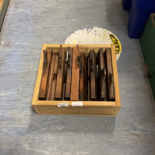 Vintage lot of antique wooden moulding planes for woodworking.