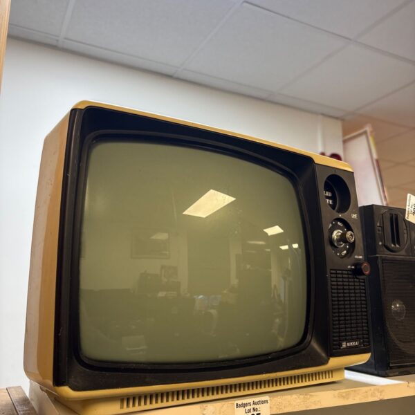 Vintage Nikkai portable CRT television with cream and black cabinet