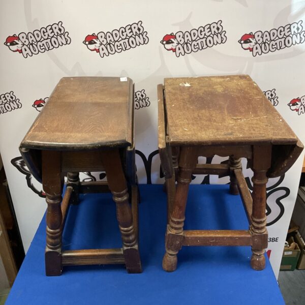 Pair of vintage oak drop leaf tables with turned legs.