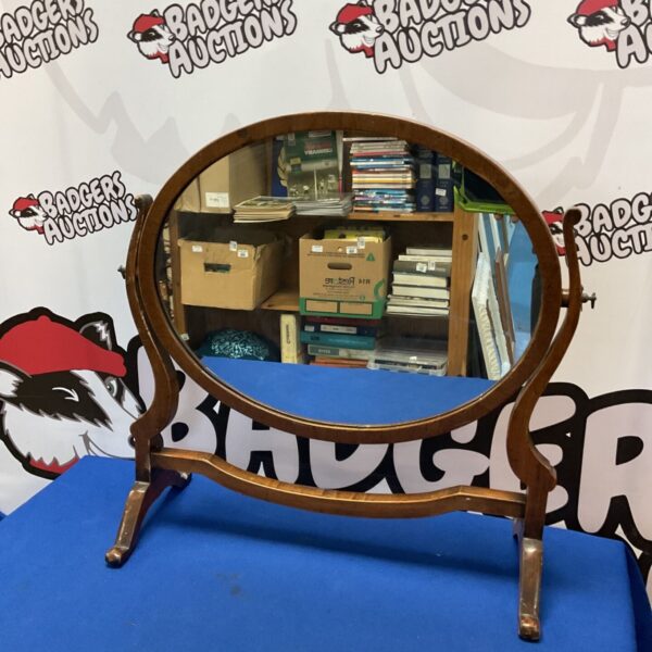 Vintage oval mahogany dressing table mirror on shaped swing stand