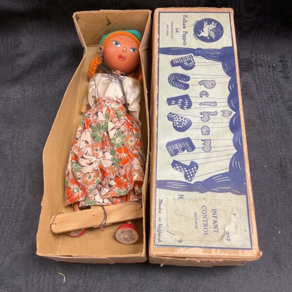 Vintage Pelham Puppet girl marionette beside its original box