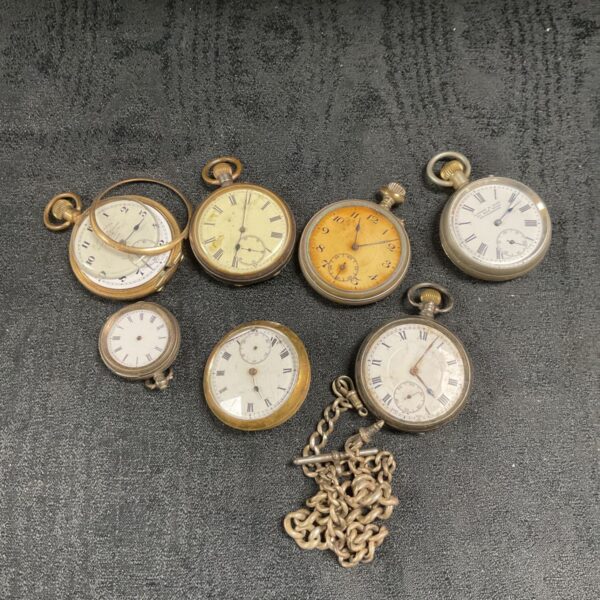 Collection of seven vintage pocket watches with chain for spares or repair