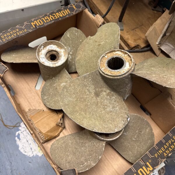 Vintage propeller blades, a lot of three nautical parts.