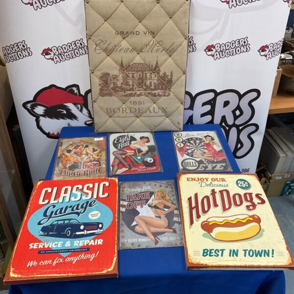 Collection of vintage reproduction wall plaques for retro decor.