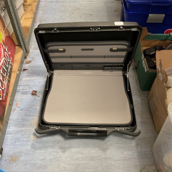 Vintage Samsonite attache case, a classic hard shell briefcase.