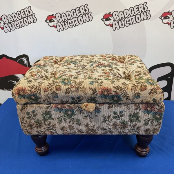 Vintage sewing box footstool with floral tapestry upholstery.