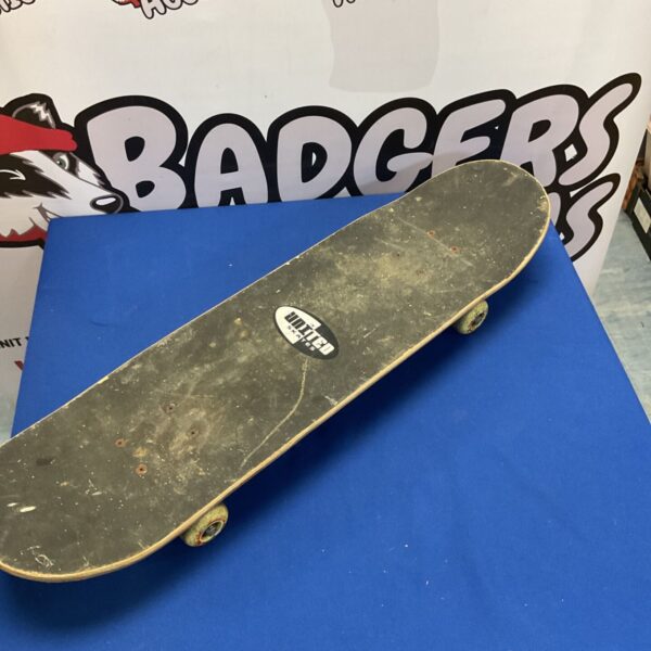 Vintage skateboard with black deck and United Skates logo.