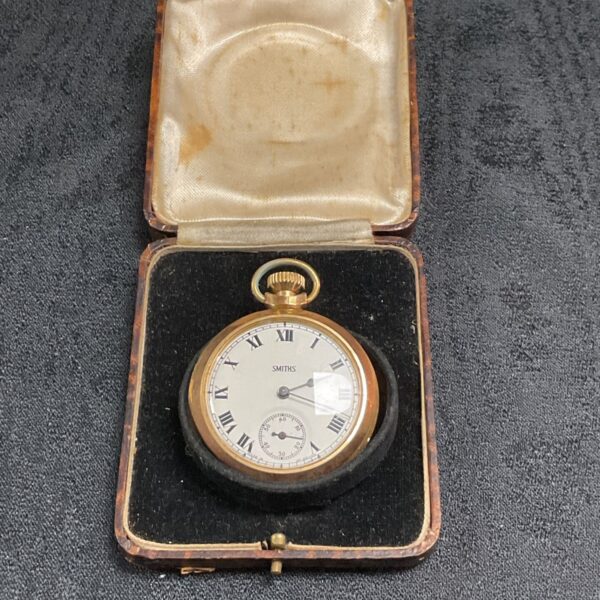 Vintage Smiths gilt pocket watch with Roman numeral dial in fitted case
