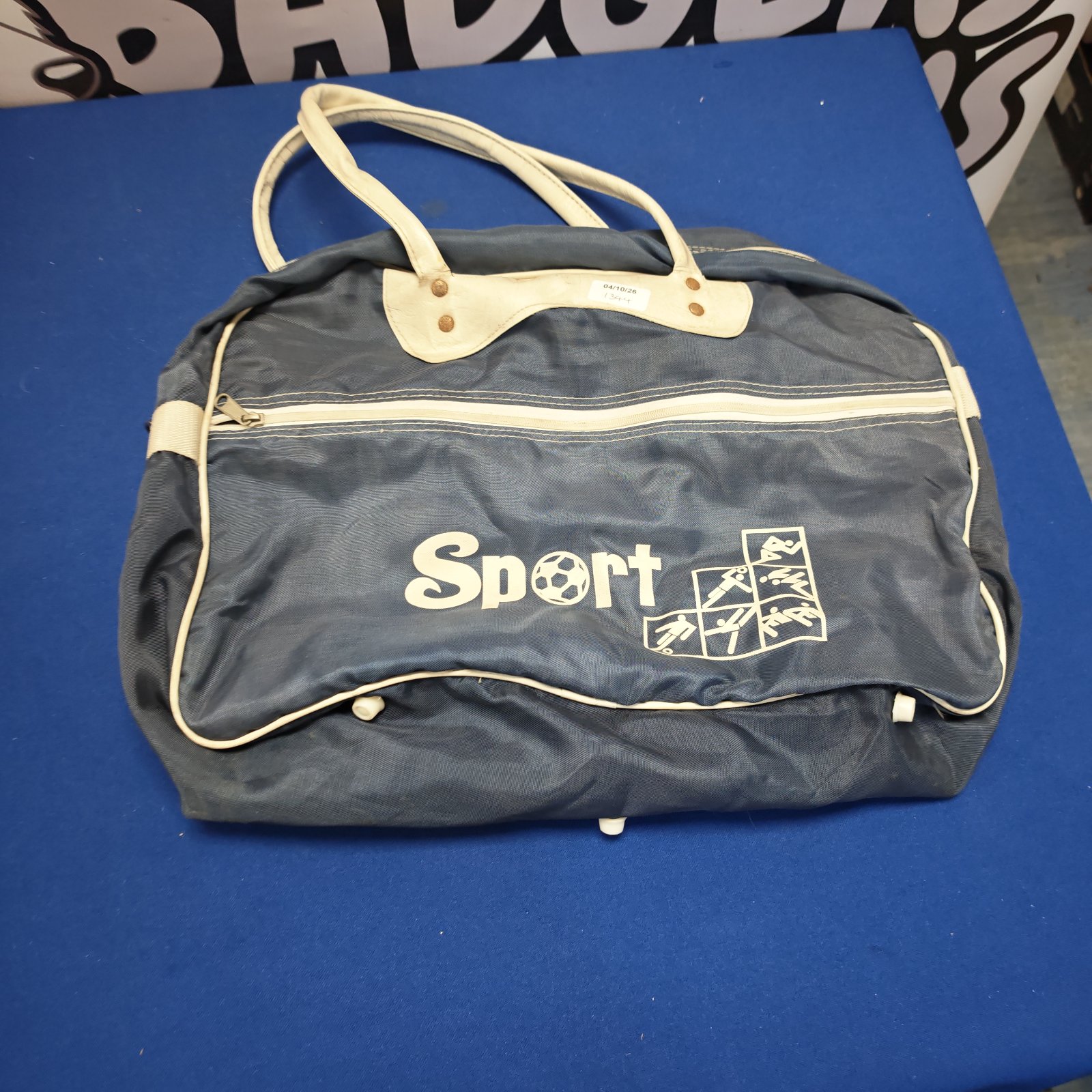 Blue vintage sports holdall, retro gym bag for collectors.