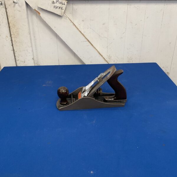 Vintage Stanley No. 4 1/2 bench smoothing plane with wooden tote and knob