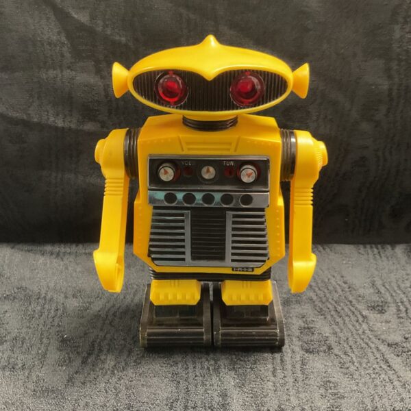 Yellow vintage Star Command I R 1 2 robot radio with red lens eyes