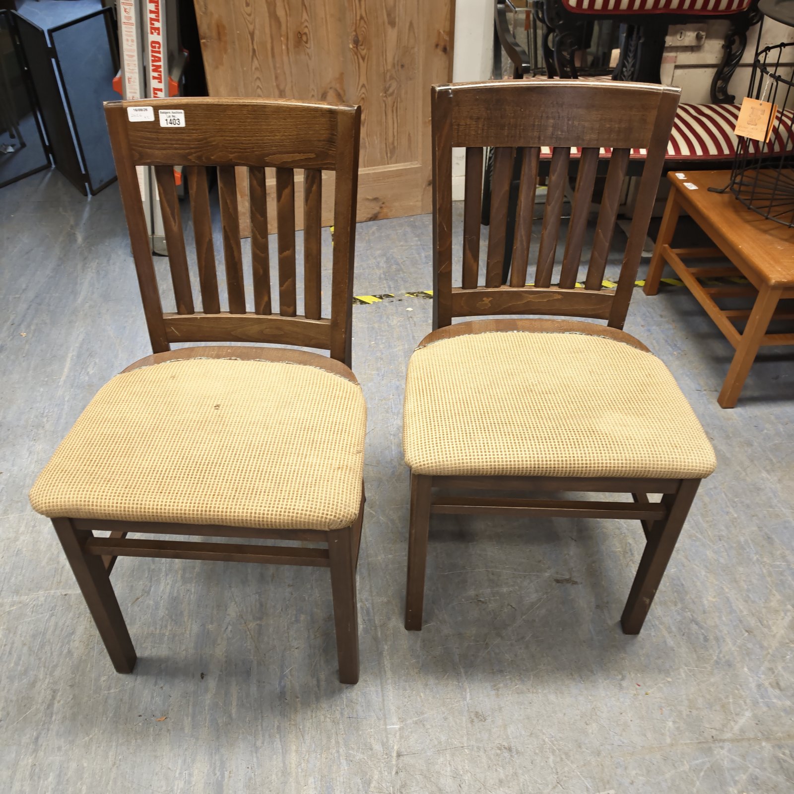 Vintage stick back dining chairs with upholstered seats, ideal for kitchen use.