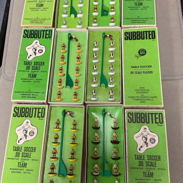 Vintage Subbuteo table soccer teams in various colours.