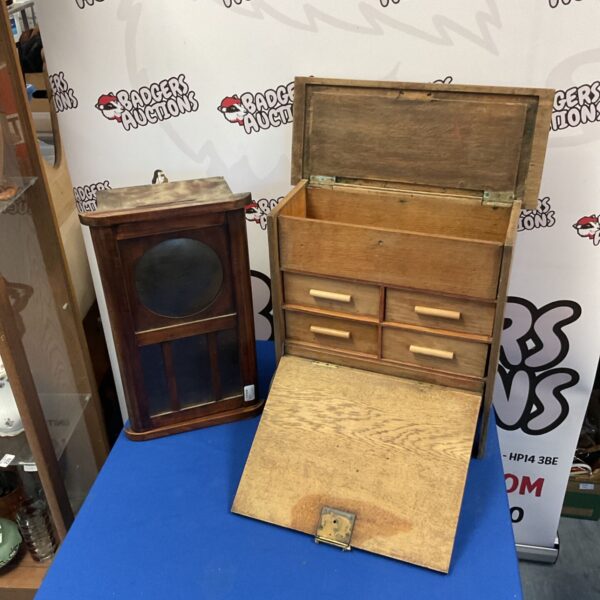 Vintage table top cabinet with drawers and clock case.