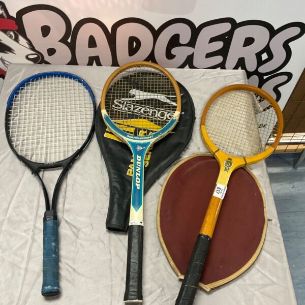 Three tennis rackets including a Dunlop Matchpoint, a wooden racket and an Eagle racket