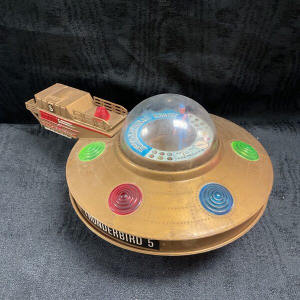 Vintage gold Thunderbird 5 International Rescue light-up toy with domed cockpit