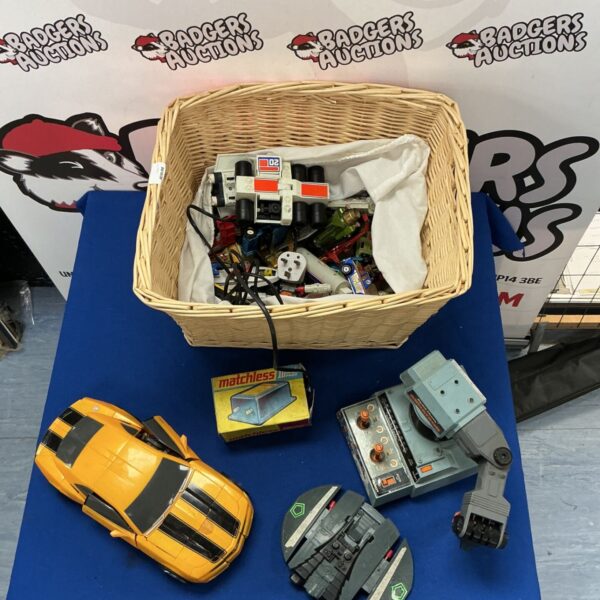 Vintage toy lot including Bumblebee and Armatron robot.