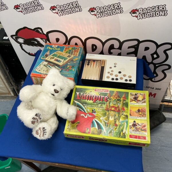 Vintage toy lot including Fisher-Price, Backgammon, and Waddingtons Vampire game.