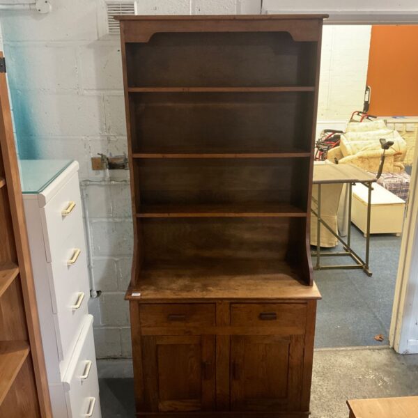 Vintage wooden kitchen dresser with open plate rack and cupboard base