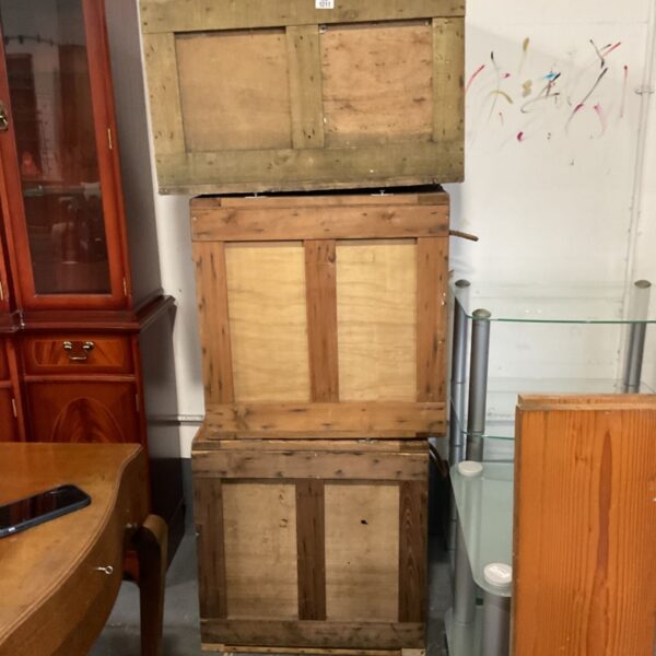 Stack of three vintage wooden storage boxes with timber battened frames