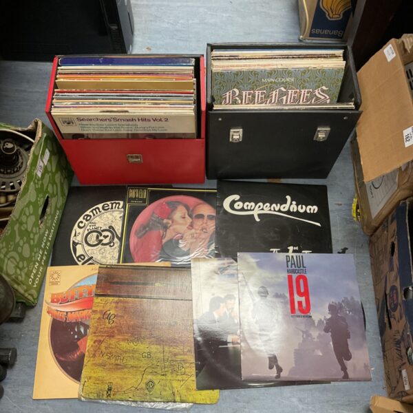 Two cases of 12 inch vinyl records including Bee Gees and Paul Hardcastle