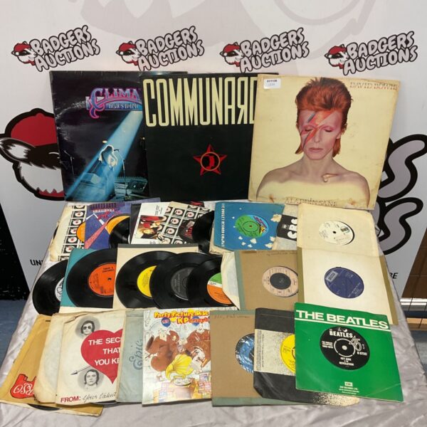 Mixed lot of 12” and 7” vinyl records including David Bowie and The Beatles