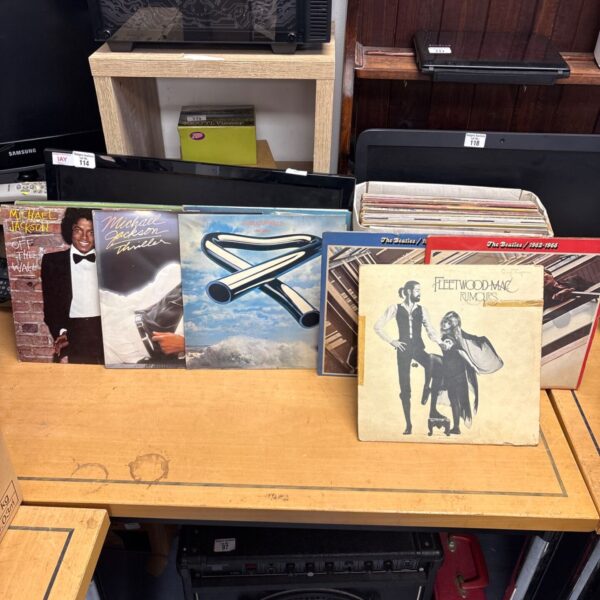 Selection of vinyl records including Michael Jackson and Fleetwood Mac.
