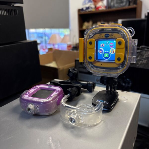Two VTech action cameras with black GoPro mount and clamp bracket