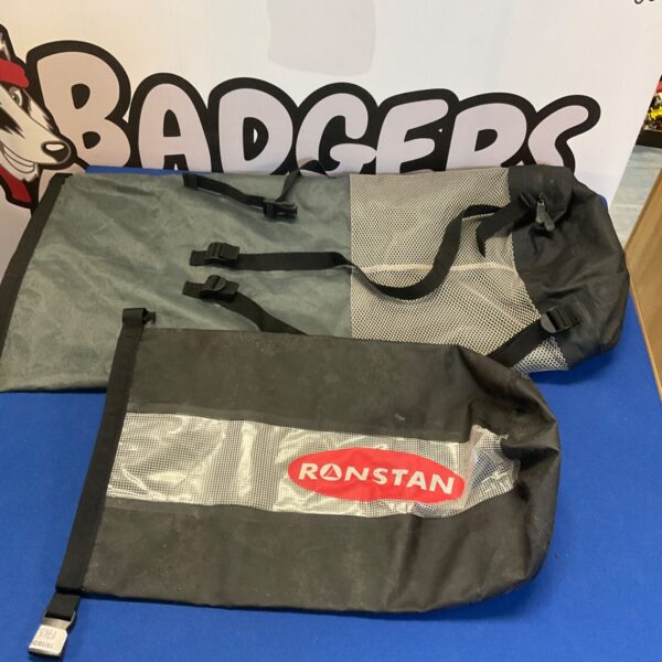 Pair of waterproof duffel bags for outdoor and travel use.