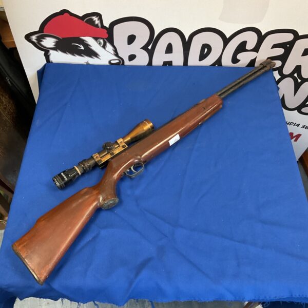 Vintage Weihrauch HW77 air rifle with silver antler scope for restoration.