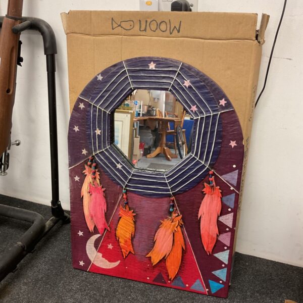 Vibrant 1980s Wendy Earley moon mirror with purple and star details.