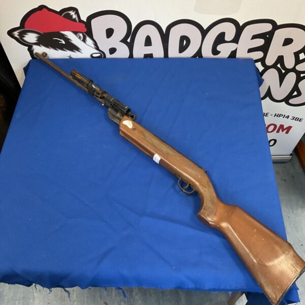 Vintage Westlake air rifle with scope, ideal for restoration.
