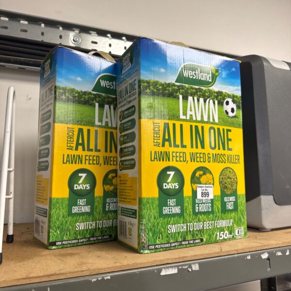 Two sealed boxes of Westland All In One lawn feed for garden care.