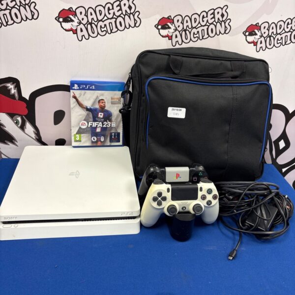 White Sony PlayStation 4 console with controllers, charging dock, cables, carry bag and FIFA 23