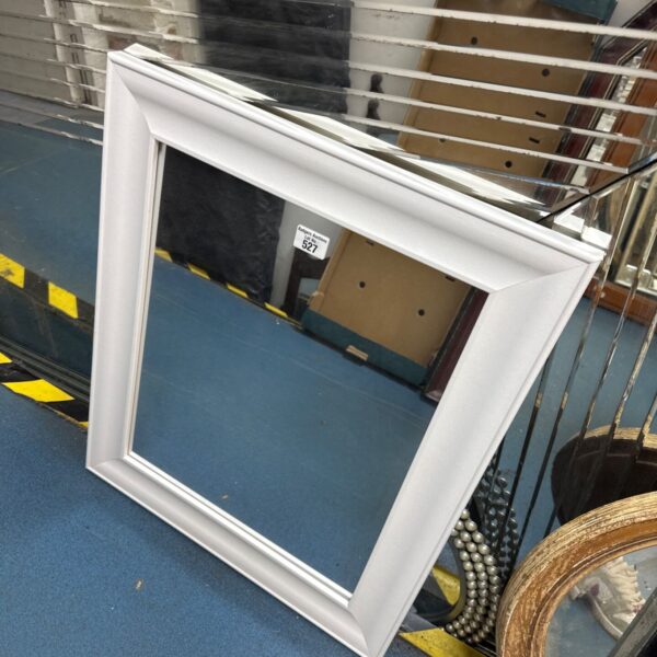 White wood framed mirror for wall decor, 21x25 inches.