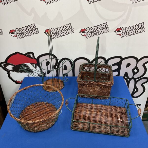 Collection of four vintage wire and wicker baskets for storage.