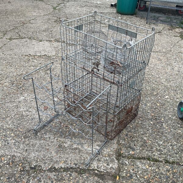 Vintage metal wire wine rack with tiered bottle storage.