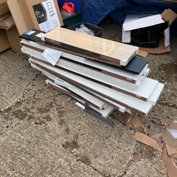 Lot of untreated wood panels for DIY projects.