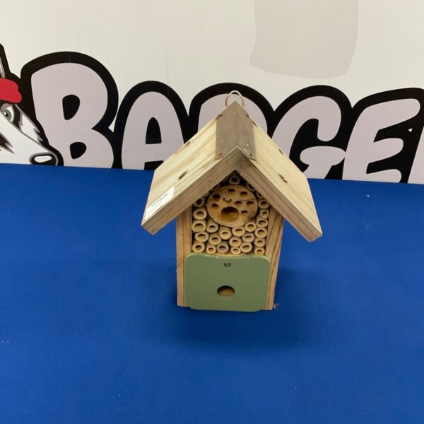 Wooden insect hotel for attracting bees and other garden insects.