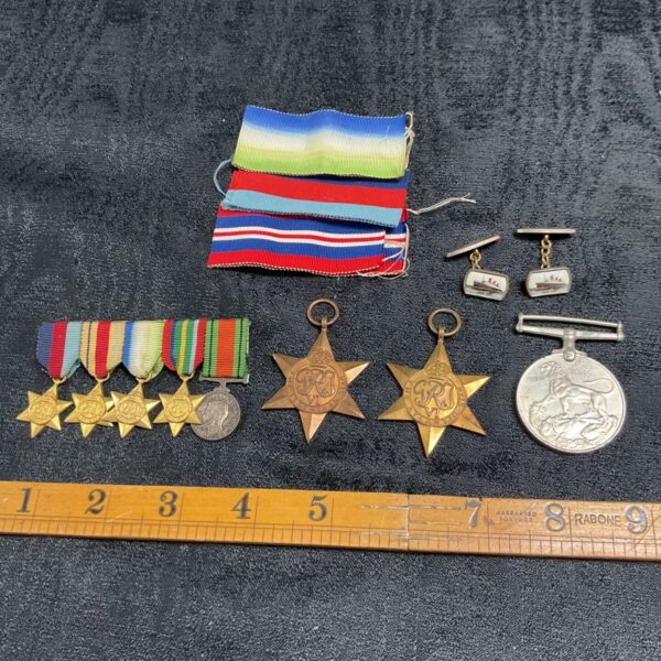 Three WW2 medals with miniature medal set and Queen Mary cufflinks